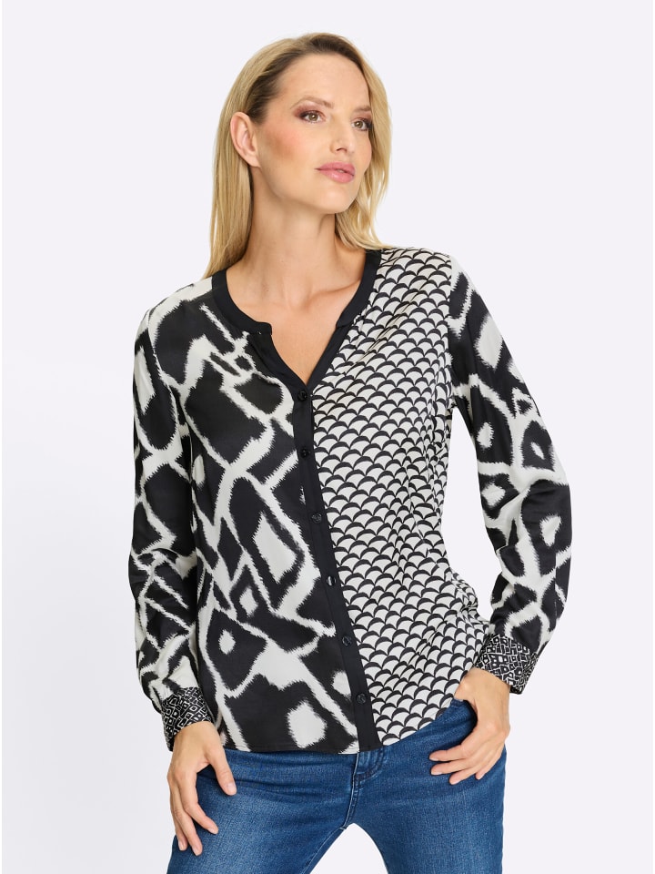 Блузка с принтом в цвете экрю и черного цвета Heine
Блузка с принтом в цвете экрю и черного цвета Heine