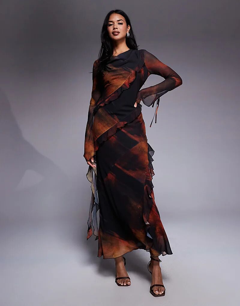 Платье макси Daska из шифона с воланами и оранжевым абстрактным принтом
Платье макси Daska из шифона с воланами и оранжевым абстрактным принтом