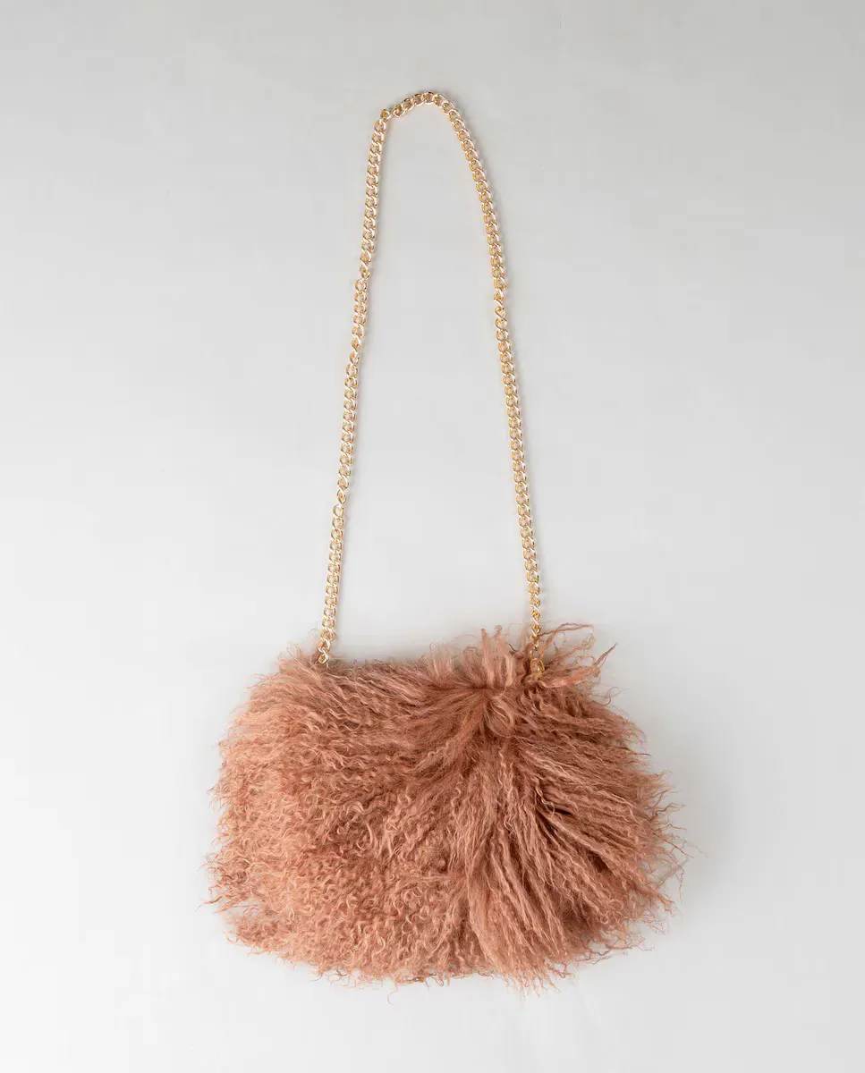 Тибетская многопозиционная сумка для шерсти ягненка De la Roca, бежевый
Тибетская многопозиционная сумка для шерсти ягненка De la Roca, бежевый