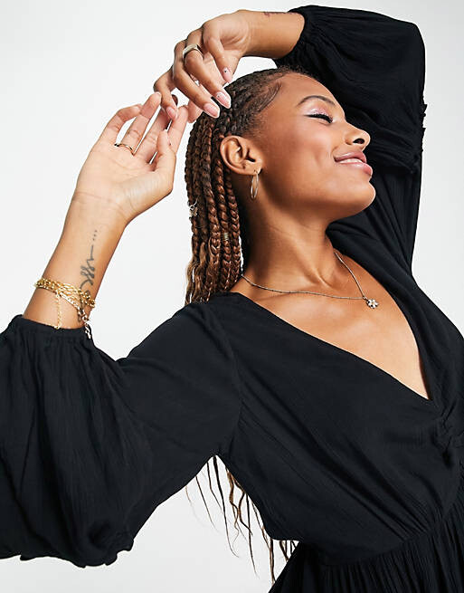 Черное пляжное платье макси-кимоно Isla & Bird
Черное пляжное платье макси-кимоно Isla & Bird