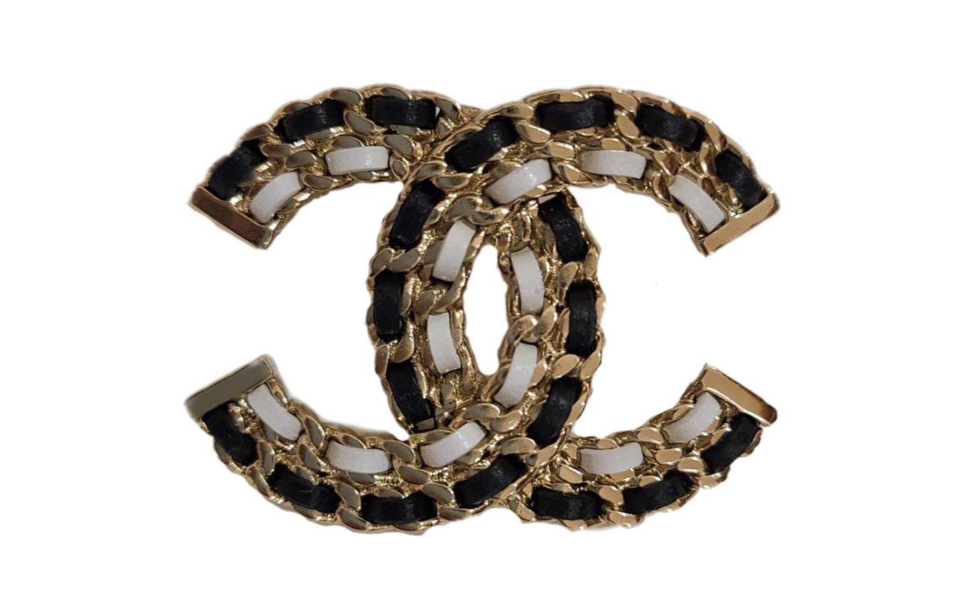 Chanel Женская брошь, черно-золото-белый
Chanel Женская брошь, черно-золото-белый
