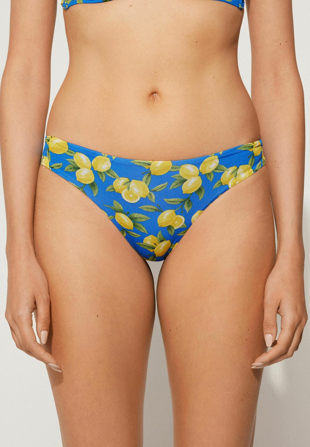 Плавки бикини SORRENTO LEMON Tezenis, синий
Плавки бикини SORRENTO LEMON Tezenis, синий