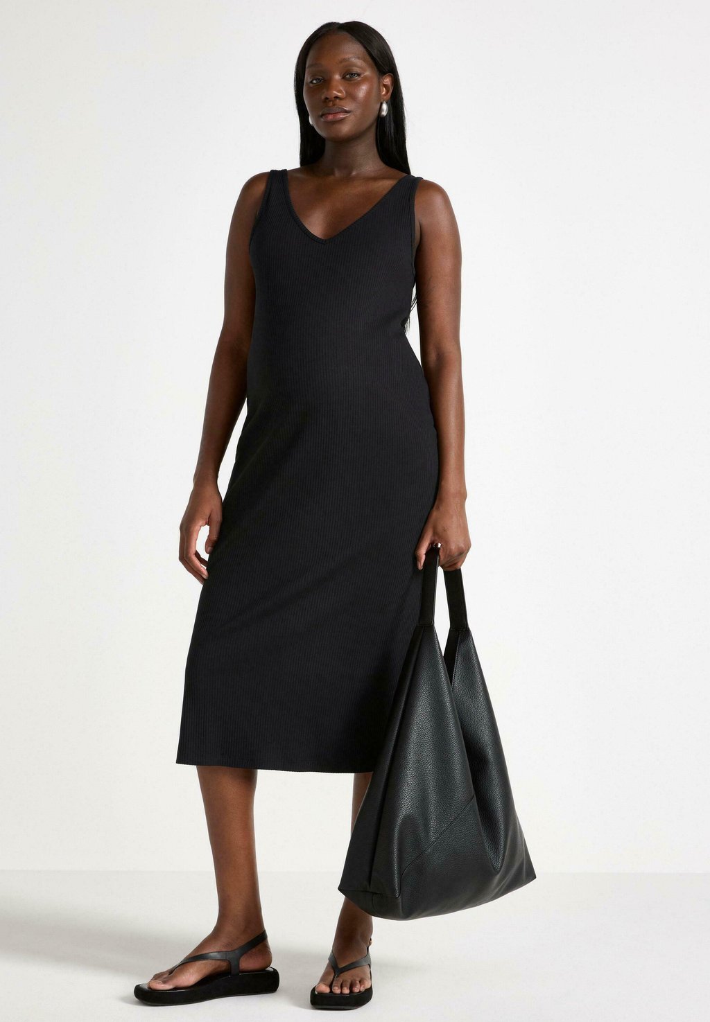 Вязаное платье MOM MIDI Lindex, черный
Вязаное платье MOM MIDI Lindex, черный