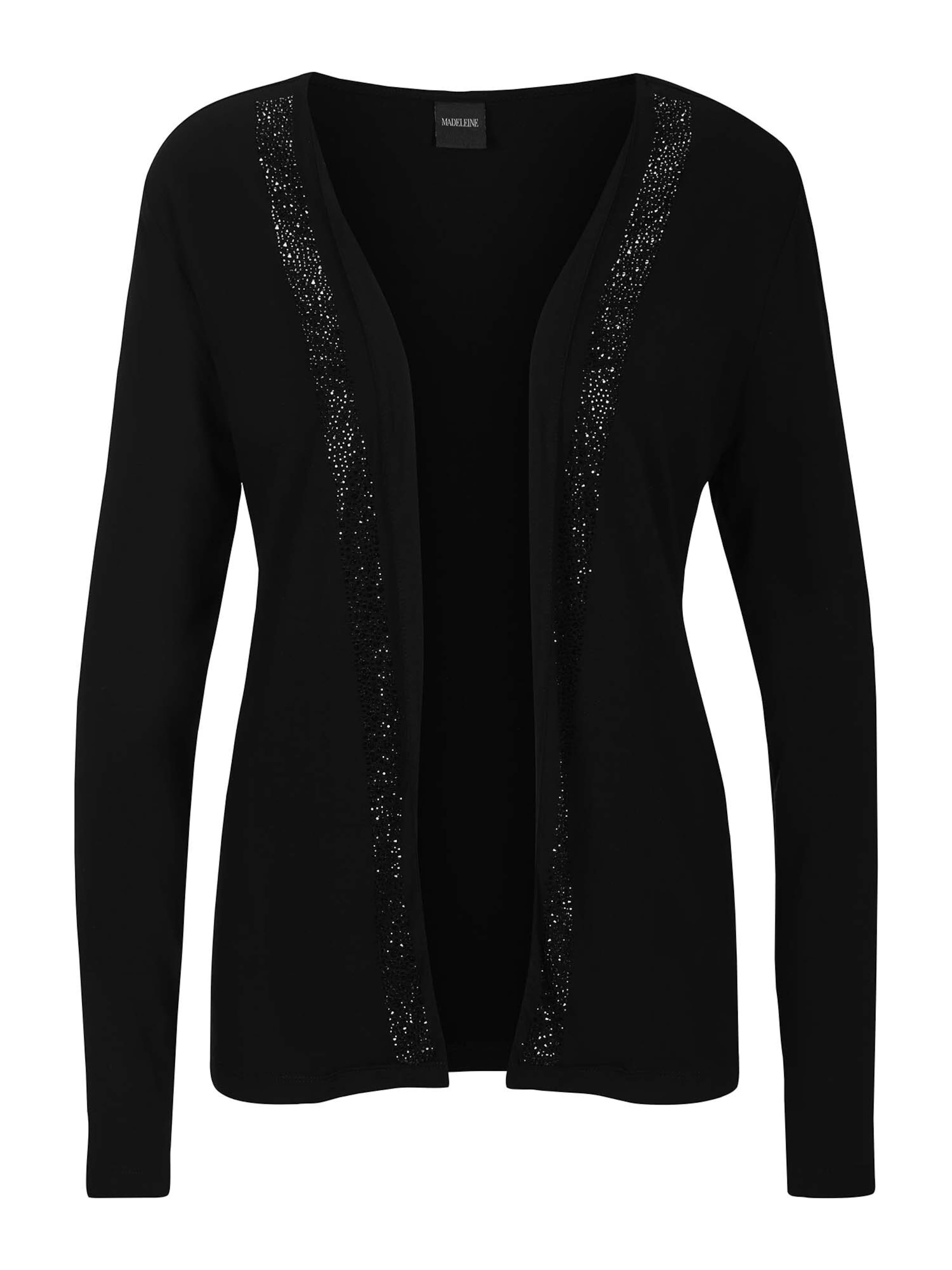 MADELEINE Вязаный кардиган в черном цвете
MADELEINE Вязаный кардиган в черном цвете