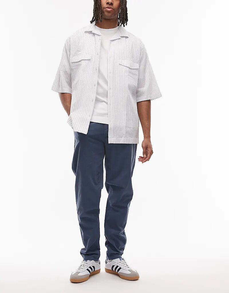 Вельветовые брюки Tommy Jeans Isaac темно-синего цвета
Вельветовые брюки Tommy Jeans Isaac темно-синего цвета