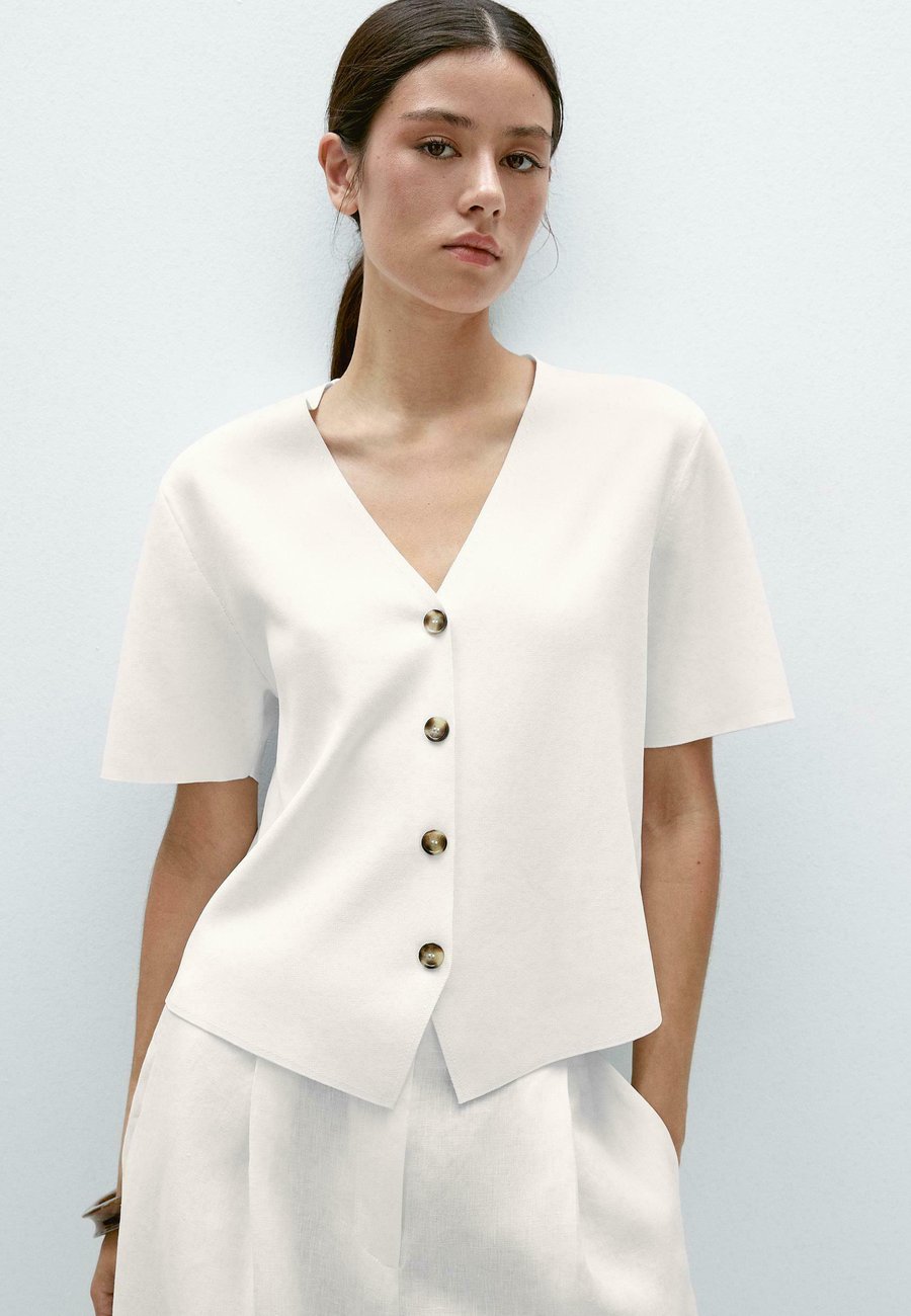 Блуза Massimo Dutti FLOWING SHORT SLEEVE WITH V-NECK, White
Блуза Massimo Dutti FLOWING SHORT SLEEVE WITH V-NECK, White