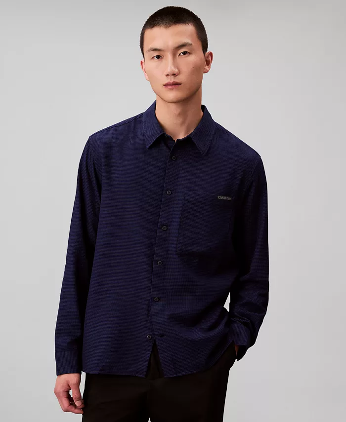 Мужская классическая рубашка из меланжевой ткани в узоре "гусиная лапка" Calvin Klein, синий
Мужская классическая рубашка из меланжевой ткани в узоре "гусиная лапка" Calvin Klein, синий