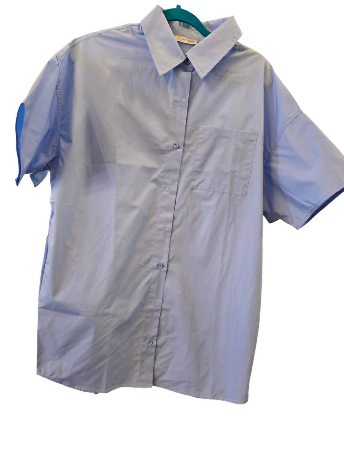 Женское платье с карманами в голубом цвете Carole's Collections
Женское платье с карманами в голубом цвете Carole's Collections