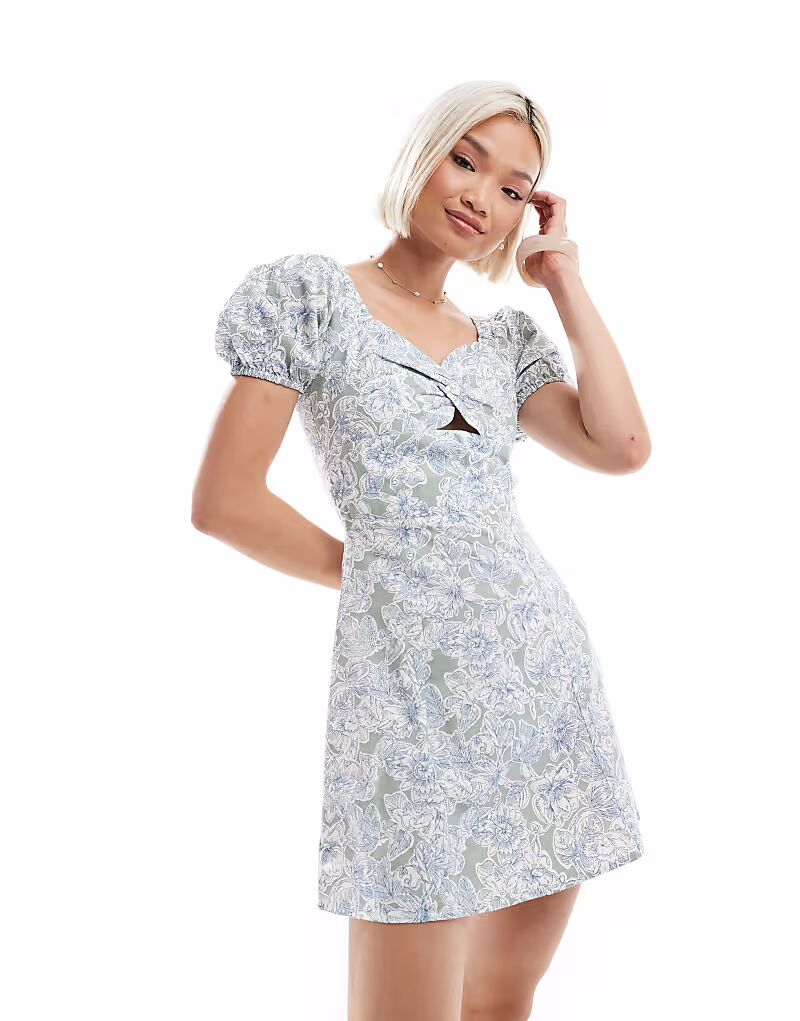 Brave Soul - Мини-платье доярки зеленого цвета со льном, цветочным принтом и рукавами-фонариками
Brave Soul - Мини-платье доярки зеленого цвета со льном, цветочным принтом и рукавами-фонариками