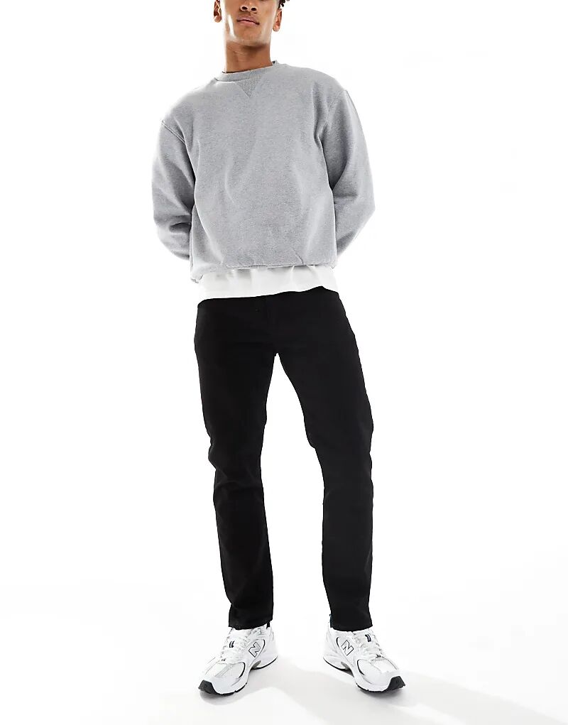 Зауженные джинсы Levi's 502 черного цвета
Зауженные джинсы Levi's 502 черного цвета