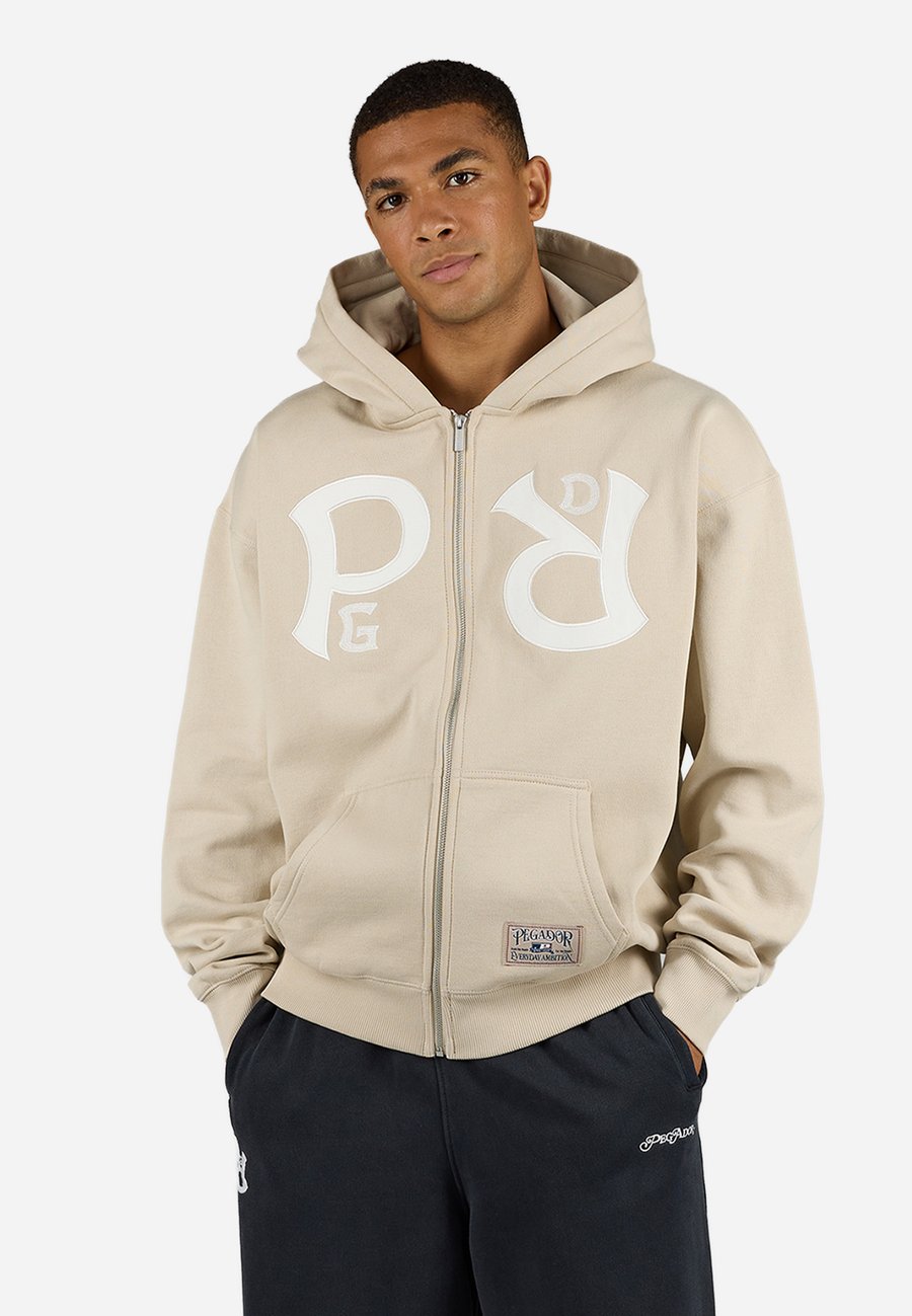 Толстовка Pegador RAVO JACKET, Washed Stone/Beige
Толстовка Pegador RAVO JACKET, Washed Stone/Beige