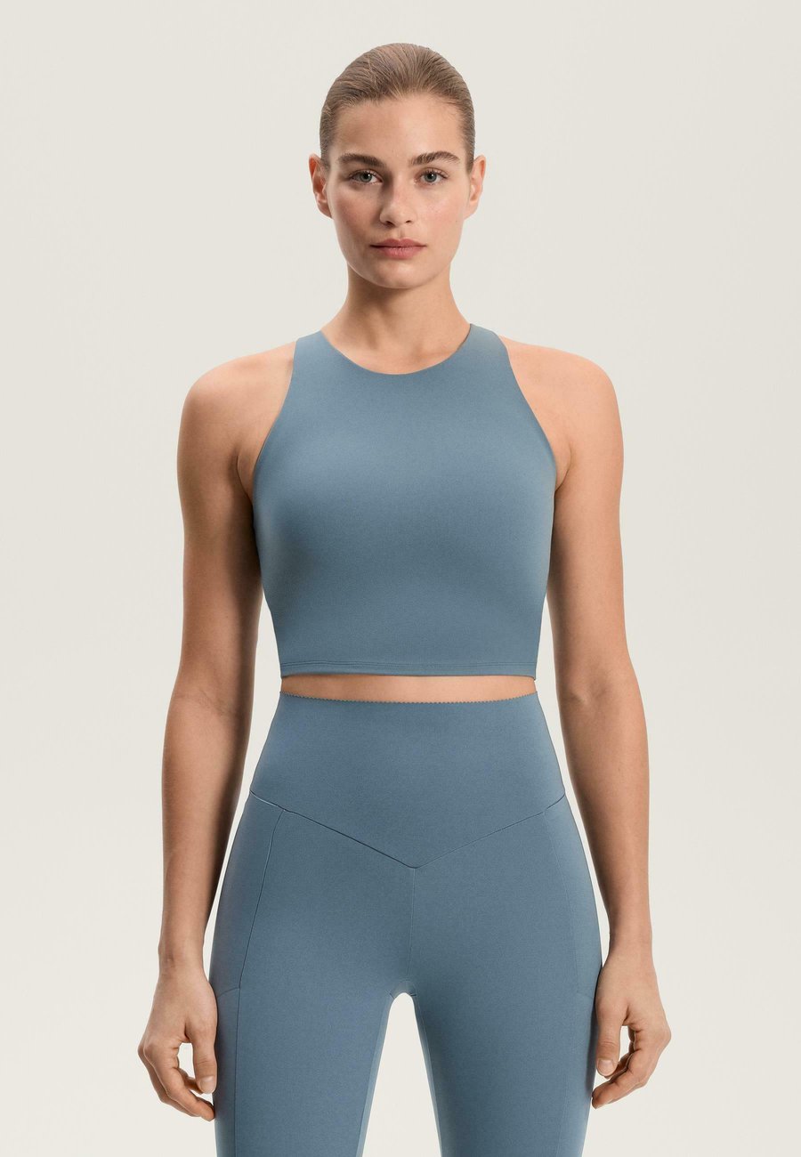 Топ OYSHO COMPRESSIVE, Stone Blue Denim/Dark Blue
Топ OYSHO COMPRESSIVE, Stone Blue Denim/Dark Blue