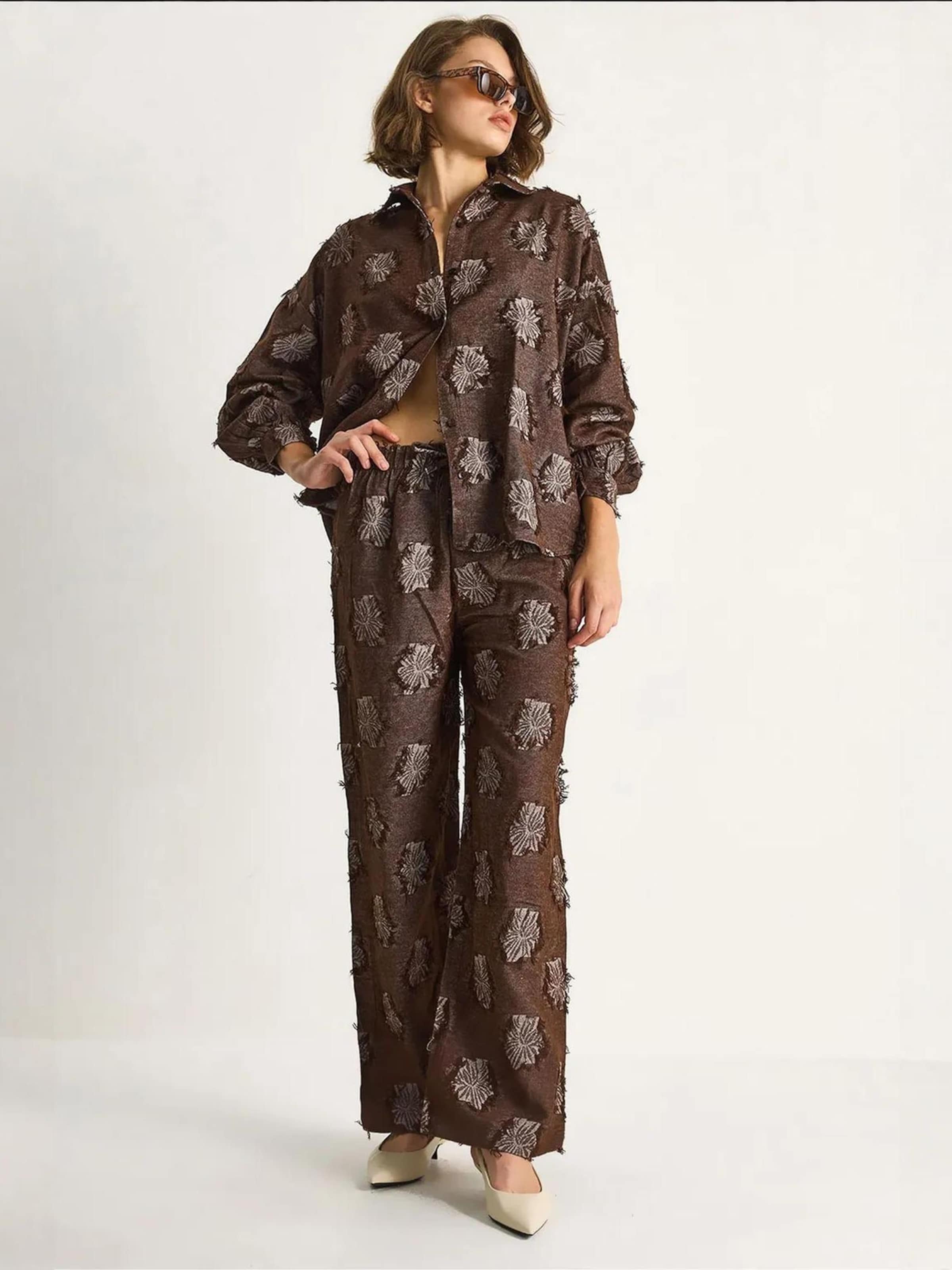 Bianco Lucci Костюм в крапинку Brown
Bianco Lucci Костюм в крапинку Brown