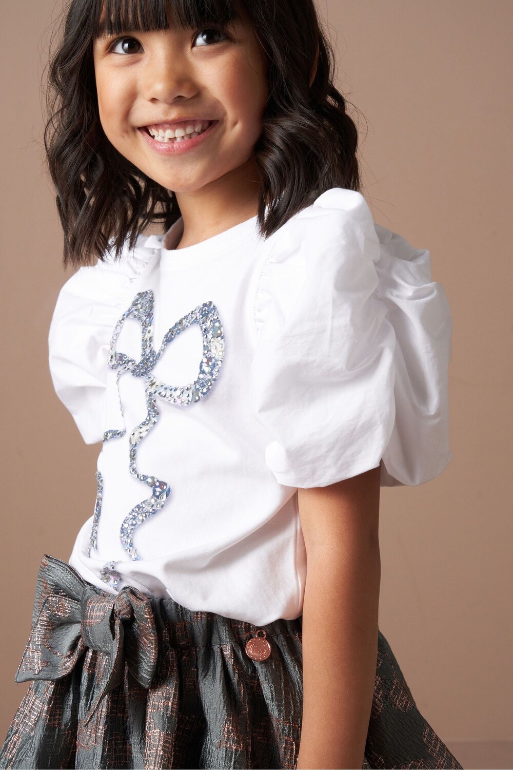 Футболка Aofie со стразами и бантом Angel & Rocket, белый
Футболка Aofie со стразами и бантом Angel & Rocket, белый