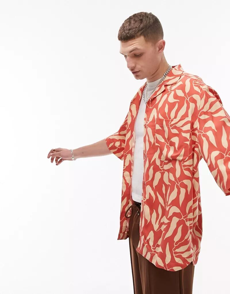 Яркая рубашка свободного кроя Topman с короткими рукавами, воротником с лацканами и принтом в виде листьев, Коричневый, Яркая рубашка свободного кроя Topman с короткими рукавами, воротником с лацканами и принтом в виде листьев
Яркая рубашка свободного кроя Topman с короткими рукавами, воротником с лацканами и принтом в виде листьев, Коричневый, Яркая рубашка свободного кроя Topman с короткими рукавами, воротником с лацканами и принтом в виде листьев