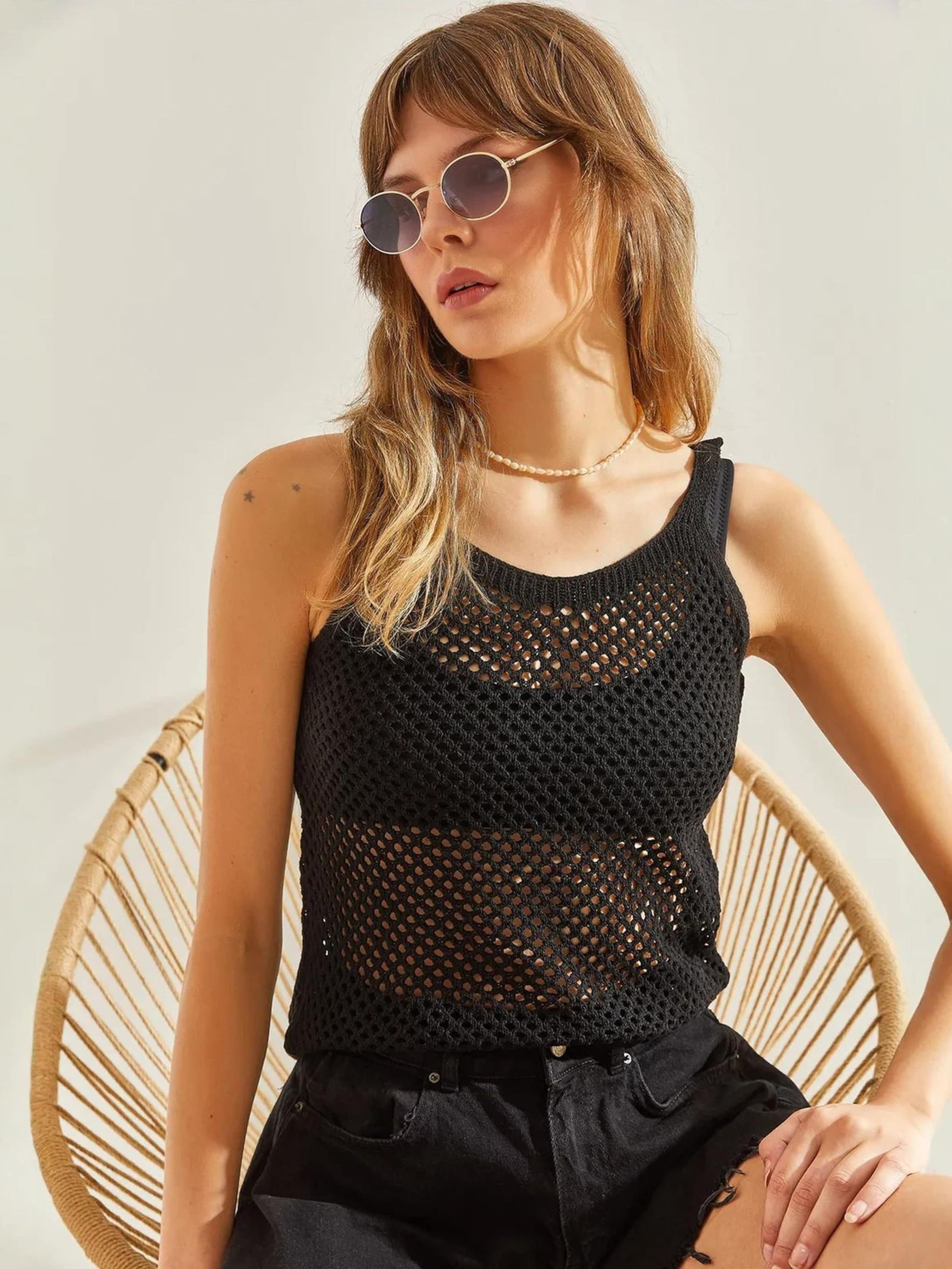 Bianco Lucci Топ в черном цвете
Bianco Lucci Топ в черном цвете