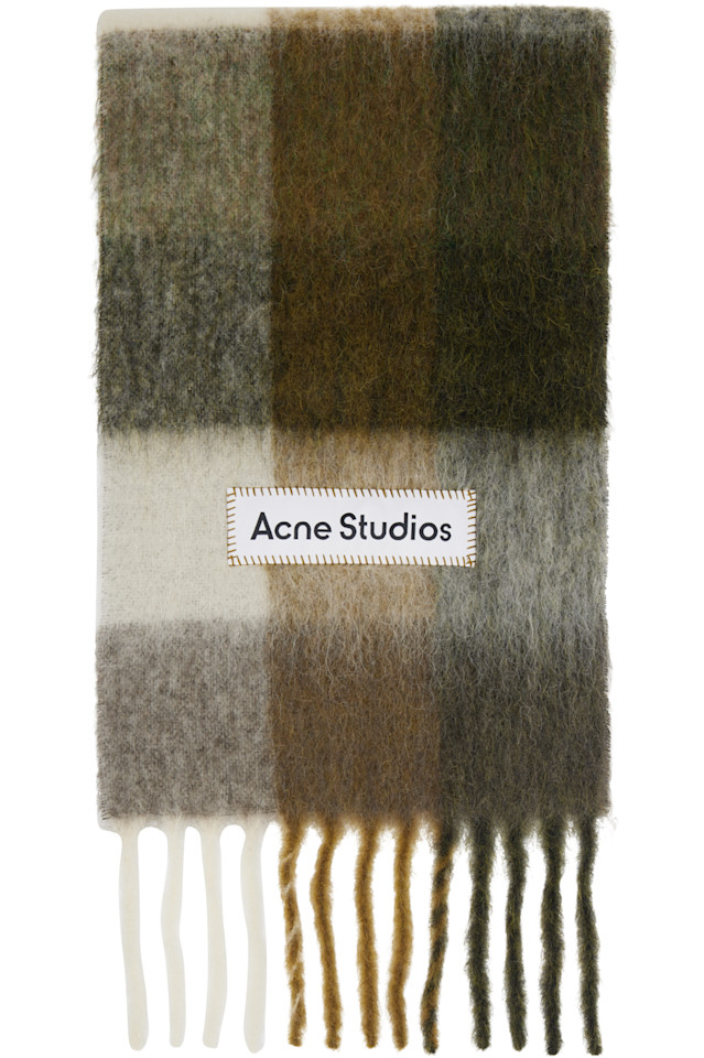 Acne Studios Шарф в клетку цвета хаки и кремового цвета с бахромой
Acne Studios Шарф в клетку цвета хаки и кремового цвета с бахромой