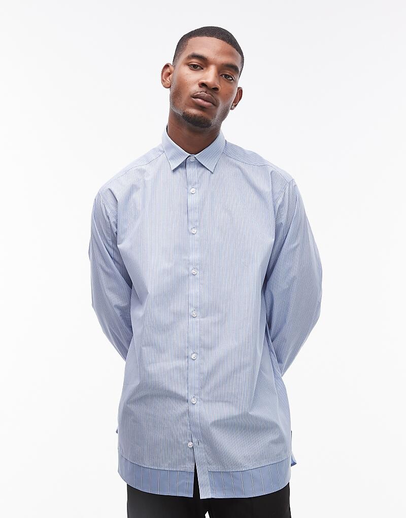 Topman – синяя рубашка oversize с длинными рукавами и комбинированными полосатыми элементами
Topman – синяя рубашка oversize с длинными рукавами и комбинированными полосатыми элементами