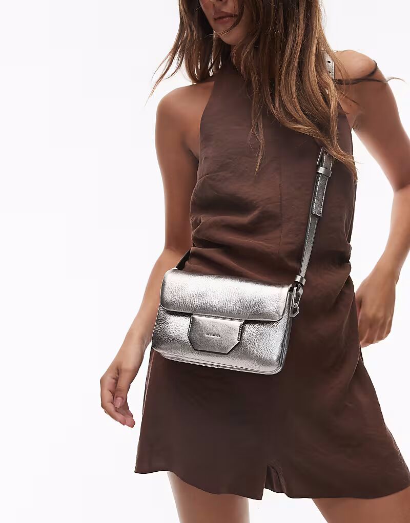 Сумка-кроссбоди Allsaints Jupiter в серебряном цвете
Сумка-кроссбоди Allsaints Jupiter в серебряном цвете