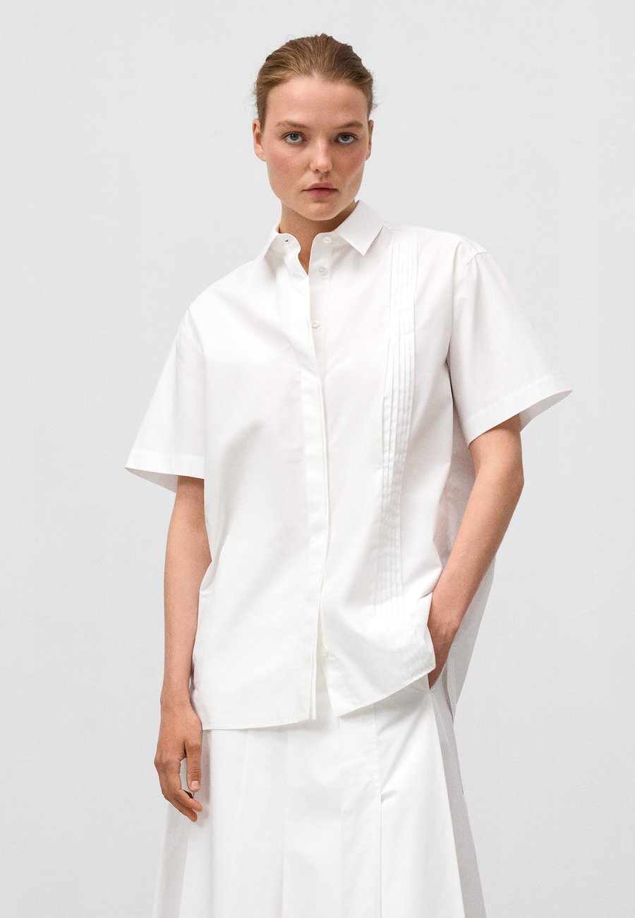 Блуза ADOLFO DOMINGUEZ Button-down blouse, White
Блуза ADOLFO DOMINGUEZ Button-down blouse, White