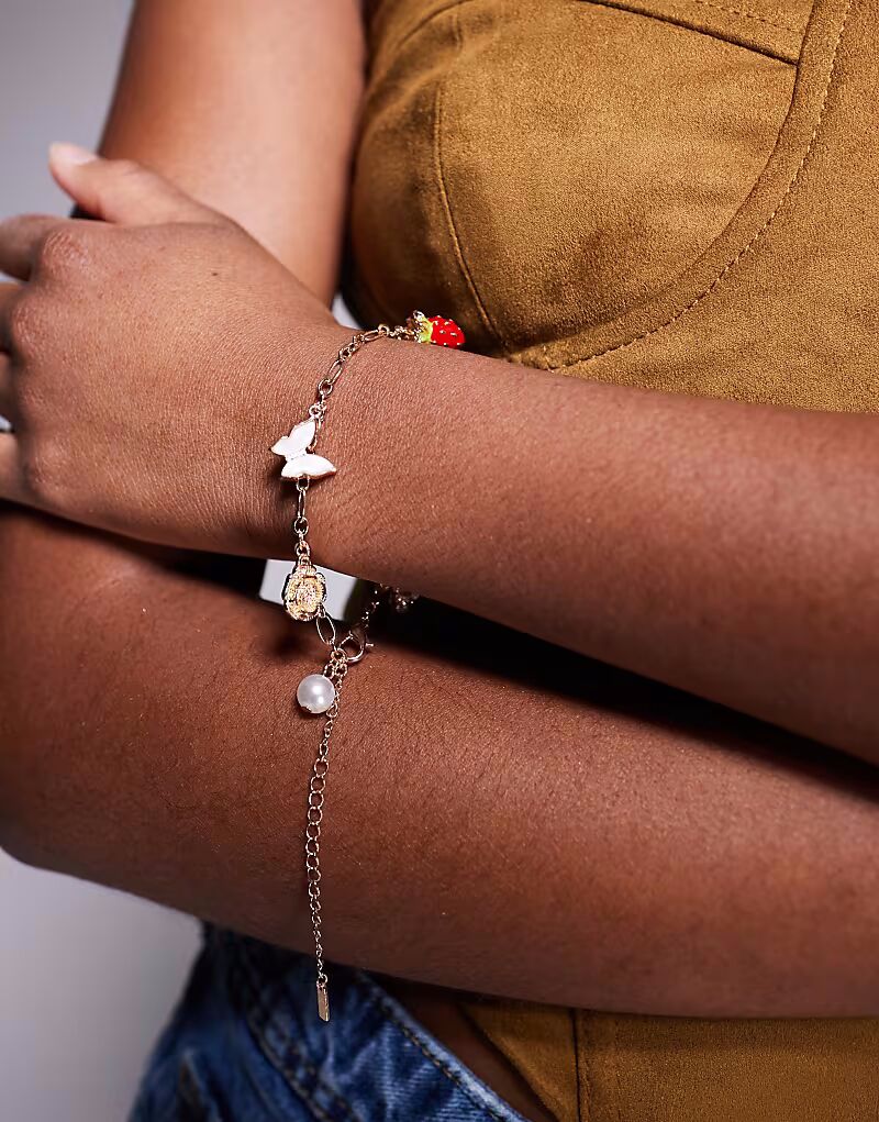 Браслет с подвесками в виде клубники berrylove из золота Aldo
Браслет с подвесками в виде клубники berrylove из золота Aldo