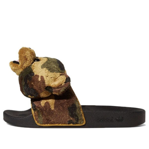 Тапочки jeremy scott x adilette slide 'camo teddy' Adidas, черный
Тапочки jeremy scott x adilette slide 'camo teddy' Adidas, черный