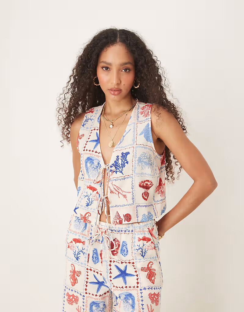 Укороченный льняной топ Nobody's Child Thandy с принтом в виде ракушек - часть комплекта
Укороченный льняной топ Nobody's Child Thandy с принтом в виде ракушек - часть комплекта