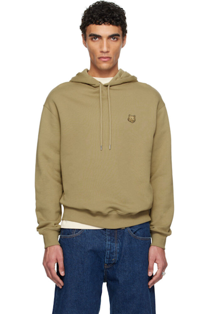 Толстовка Comfort Hoodie цвета хаки с яркой нашивкой на голову лисы Maison Kitsuné
Толстовка Comfort Hoodie цвета хаки с яркой нашивкой на голову лисы Maison Kitsuné