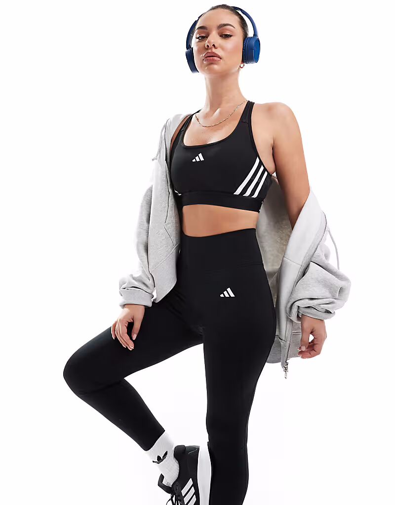 Спортивный бюстгальтер Adidas Training Essentials со средней поддержкой и тремя полосками, черный цвет
Спортивный бюстгальтер Adidas Training Essentials со средней поддержкой и тремя полосками, черный цвет
