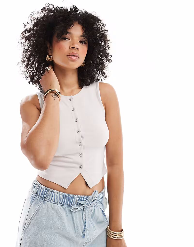 Топ без рукавов на пуговицах бежевого цвета Stradivarius
Топ без рукавов на пуговицах бежевого цвета Stradivarius