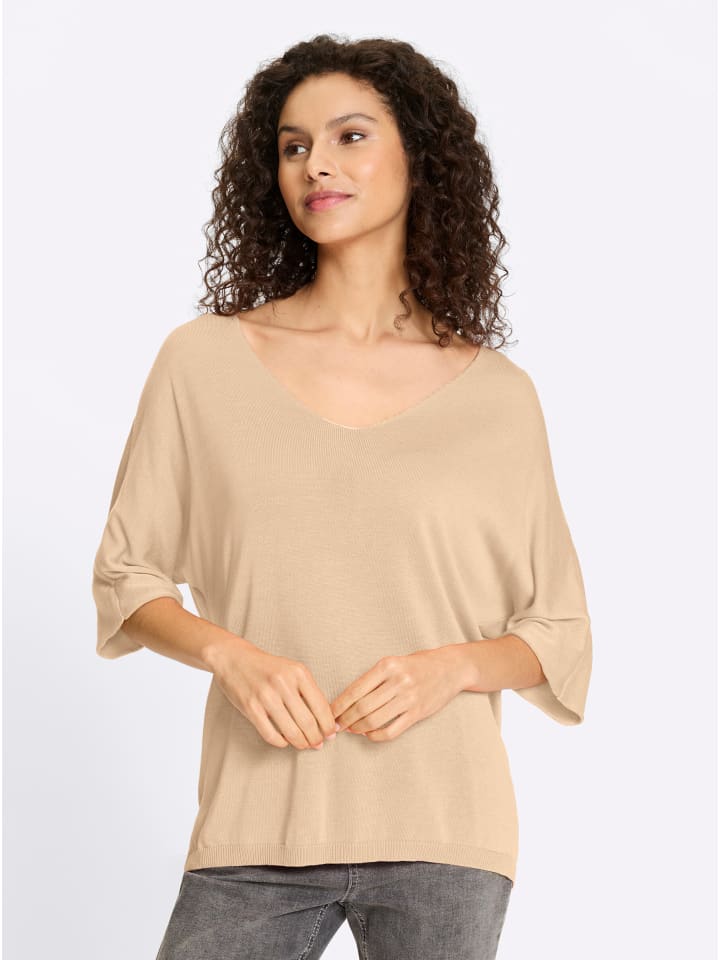 Тонкий вязаный свитер песочного цвета Heine
Тонкий вязаный свитер песочного цвета Heine