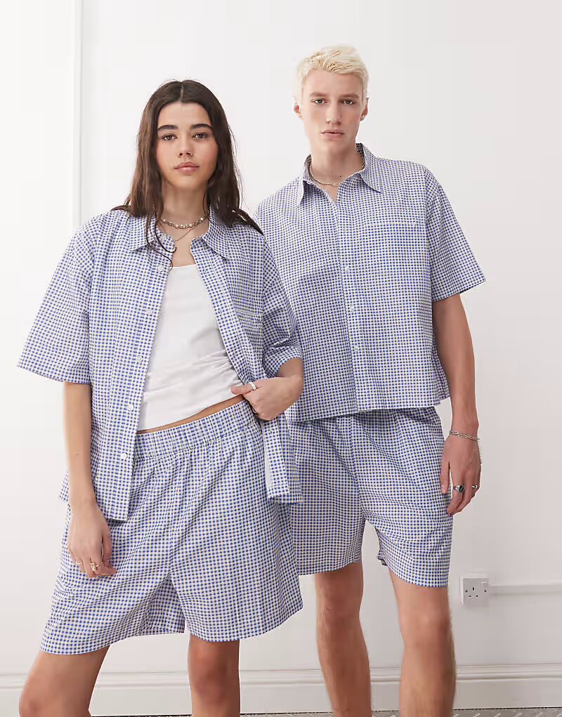 Рубашка свободного кроя унисекс с короткими рукавами в сине-белую клетку Reclaimed Vintage
Рубашка свободного кроя унисекс с короткими рукавами в сине-белую клетку Reclaimed Vintage