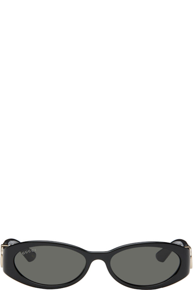 Солнцезащитные очки в черной овальной оправе Gucci
Солнцезащитные очки в черной овальной оправе Gucci