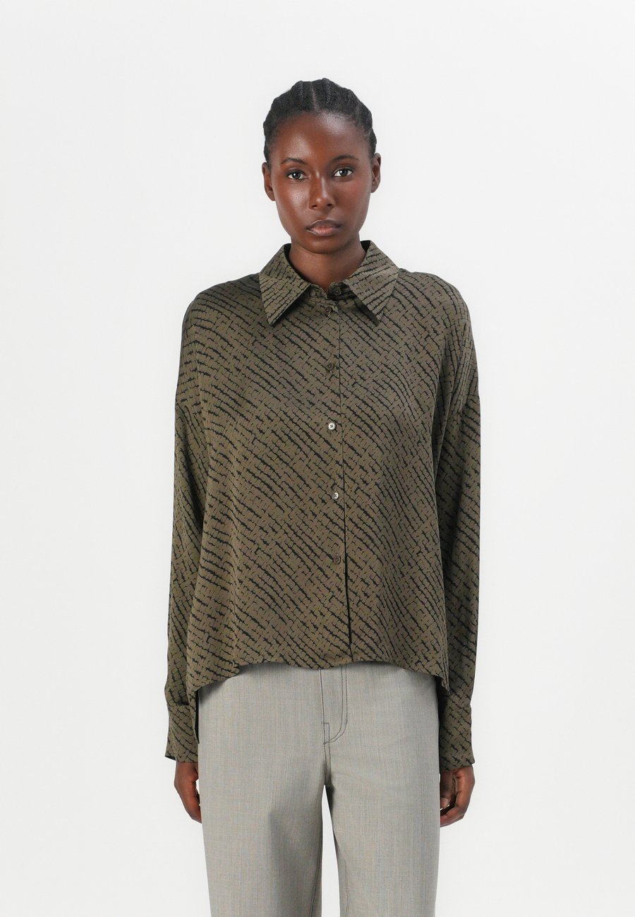 Блуза DRYKORN CLOELIA, Green/Khaki
Блуза DRYKORN CLOELIA, Green/Khaki