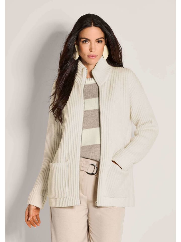 MADELEINE Мягкая шерстяная куртка на молнии, кремового цвета
MADELEINE Мягкая шерстяная куртка на молнии, кремового цвета