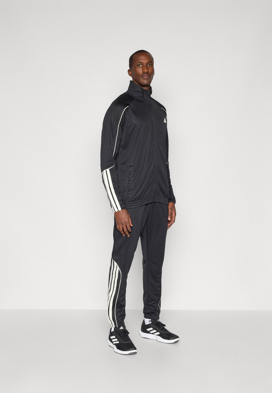 Спортивный костюм Adidas Sportswear STADIUM SET, Black/Off White/Black
Спортивный костюм Adidas Sportswear STADIUM SET, Black/Off White/Black
