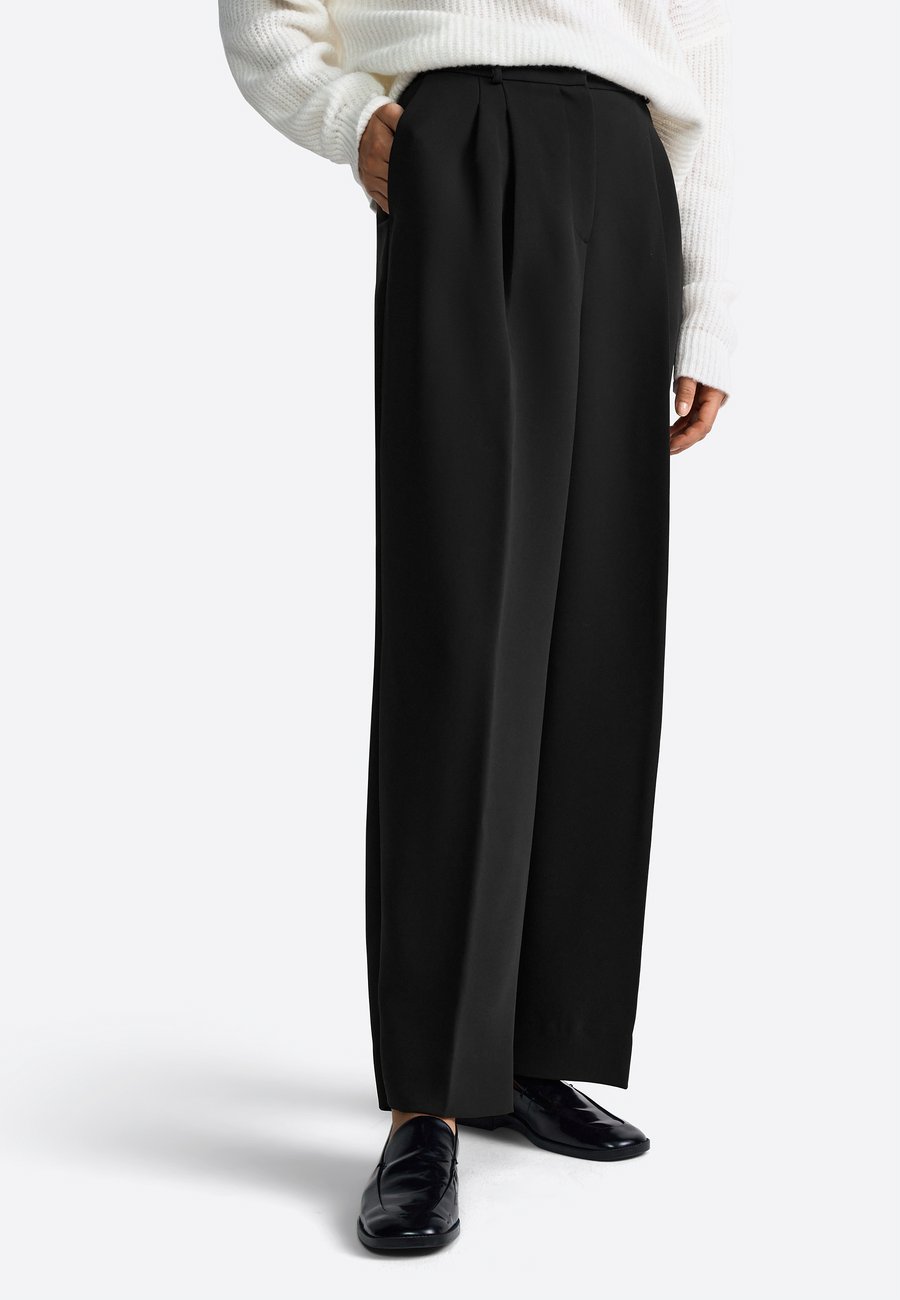 Брюки Rich & Royal Trousers, Black
Брюки Rich & Royal Trousers, Black