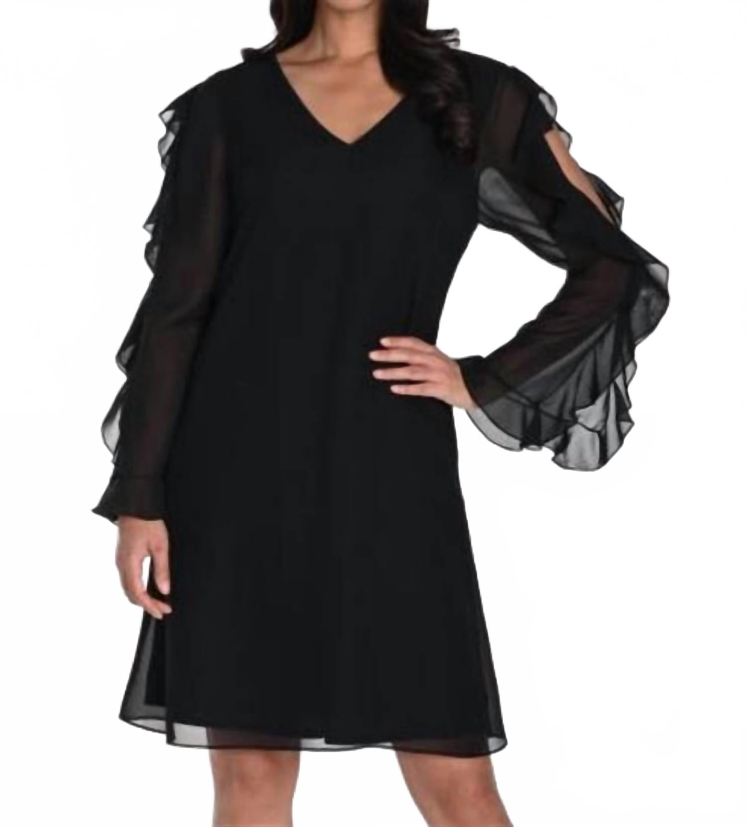 Черное платье из ткани Frank Lyman
Черное платье из ткани Frank Lyman