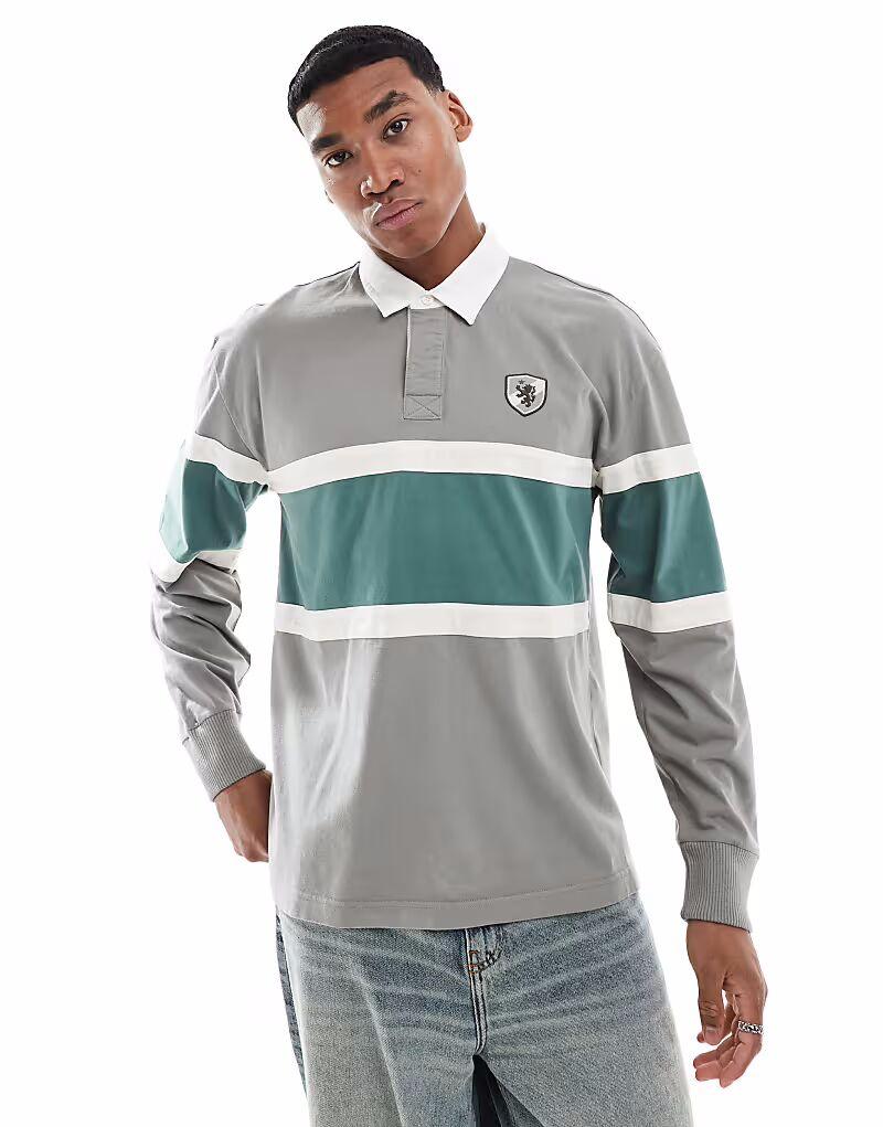 Футболка Hollister с контрастными полосками и логотипом университета в сером цвете для регби
Футболка Hollister с контрастными полосками и логотипом университета в сером цвете для регби