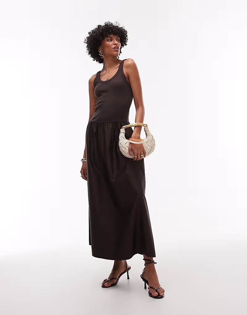 & Other Stories длинное платье из смеси трикотажа и ткани с объемным подолом темно-коричневого цвета
& Other Stories длинное платье из смеси трикотажа и ткани с объемным подолом темно-коричневого цвета