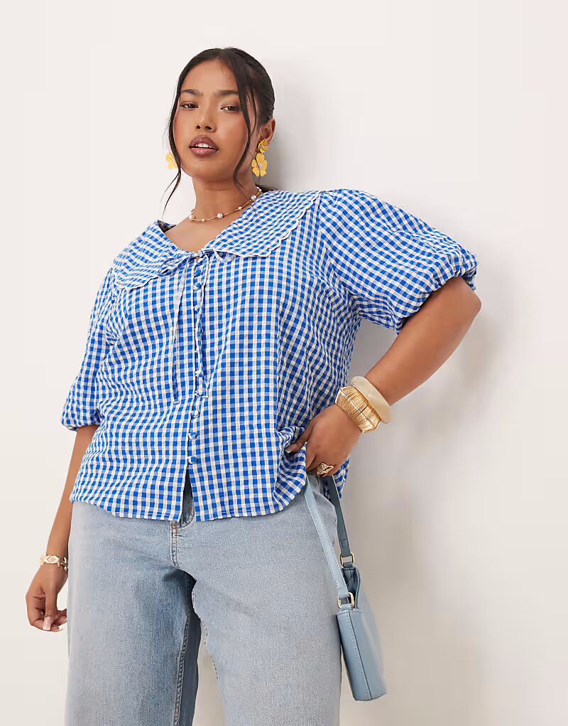 Топ Nobody's Child Plus Birdie с воротником-стойкой и рукавами-фонариками в синюю клетку
Топ Nobody's Child Plus Birdie с воротником-стойкой и рукавами-фонариками в синюю клетку