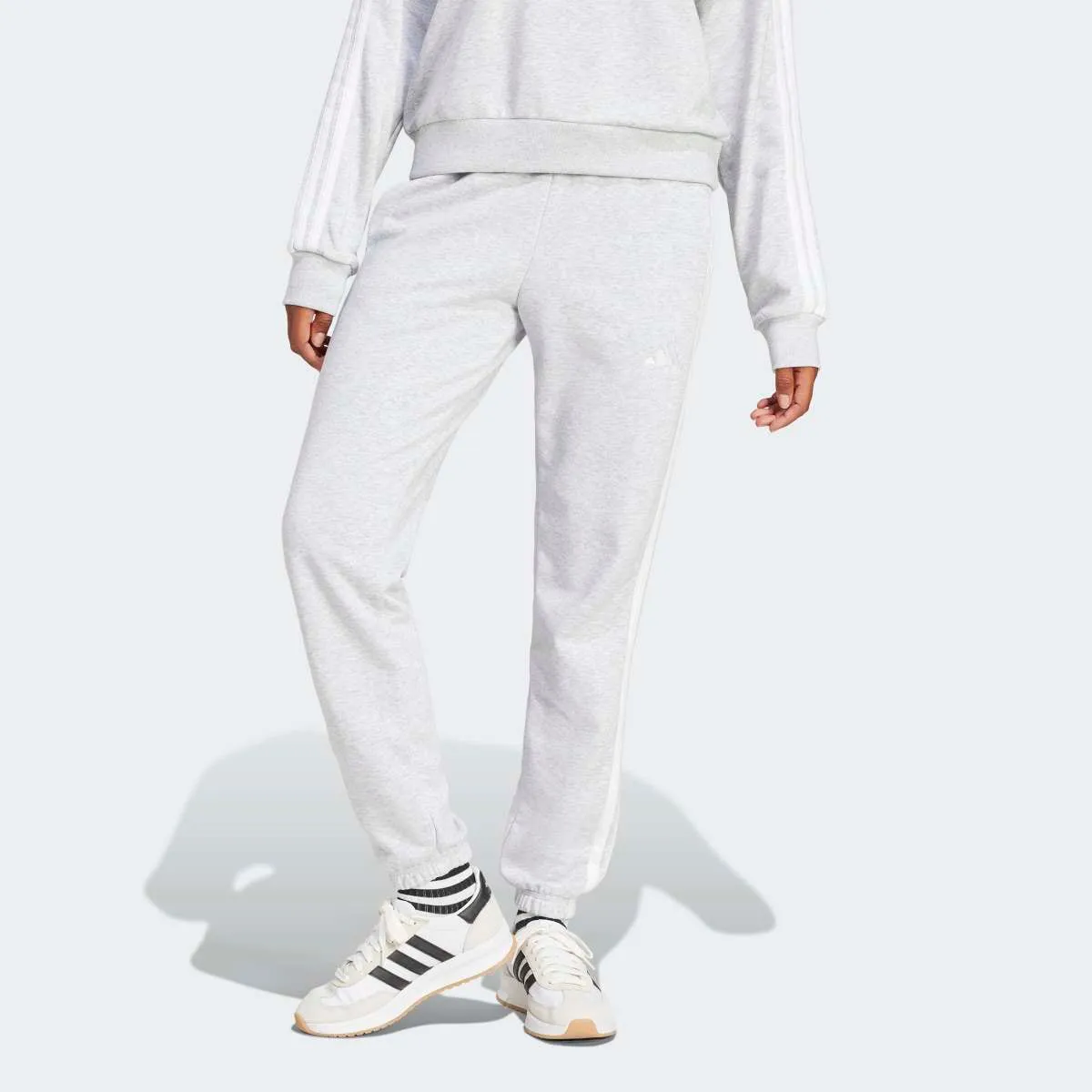 Женские брюки Essentials French Terry с манжетами и 3 полосками adidas, серый
Женские брюки Essentials French Terry с манжетами и 3 полосками adidas, серый