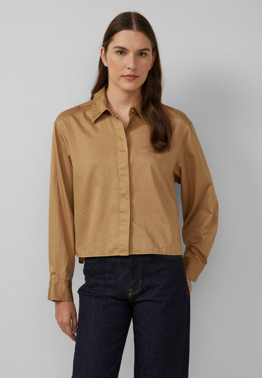 Блуза s.Oliver VERKÜRZTE MIT VERDECKTER KNOPFLEISTE, Sandstein/Beige
Блуза s.Oliver VERKÜRZTE MIT VERDECKTER KNOPFLEISTE, Sandstein/Beige