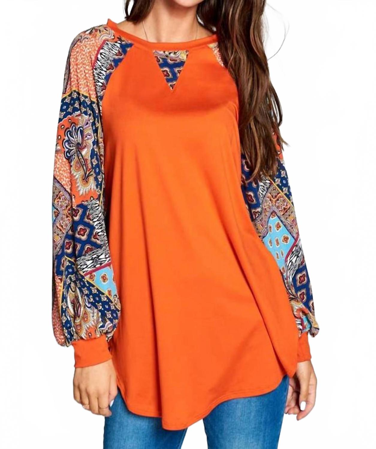 Оранжевый топ с рукавом реглан и пачворк Emerald Collection
Оранжевый топ с рукавом реглан и пачворк Emerald Collection
