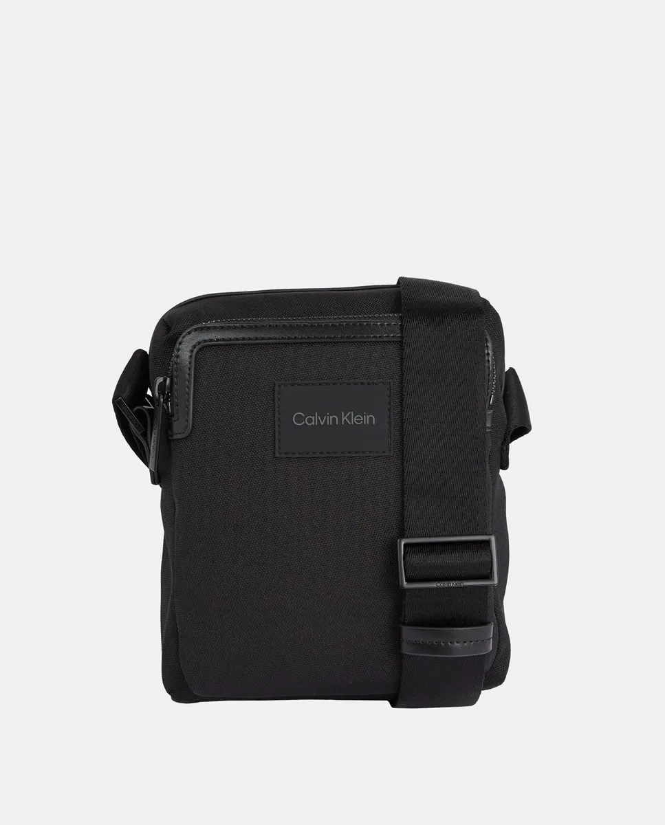 Плоская сумка через плечо из переработанного материала с регулируемой ручкой Calvin Klein, черный
Плоская сумка через плечо из переработанного материала с регулируемой ручкой Calvin Klein, черный