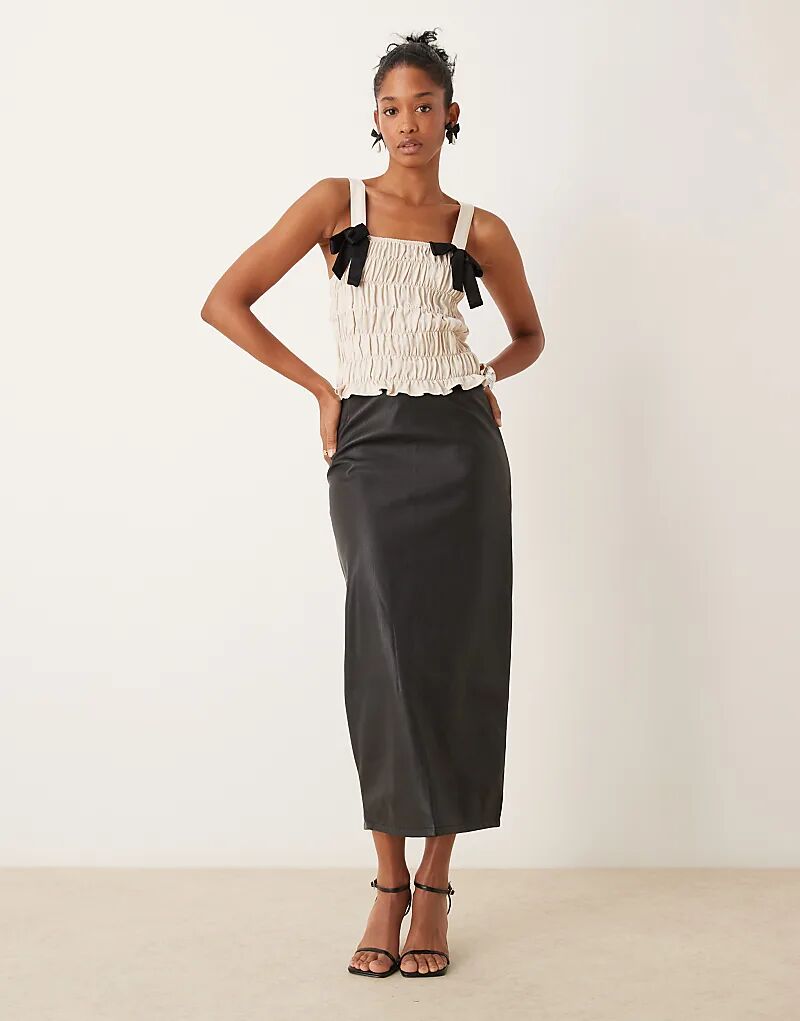 Юбка-карандаш миди из полиуретана черного цвета New Look
Юбка-карандаш миди из полиуретана черного цвета New Look