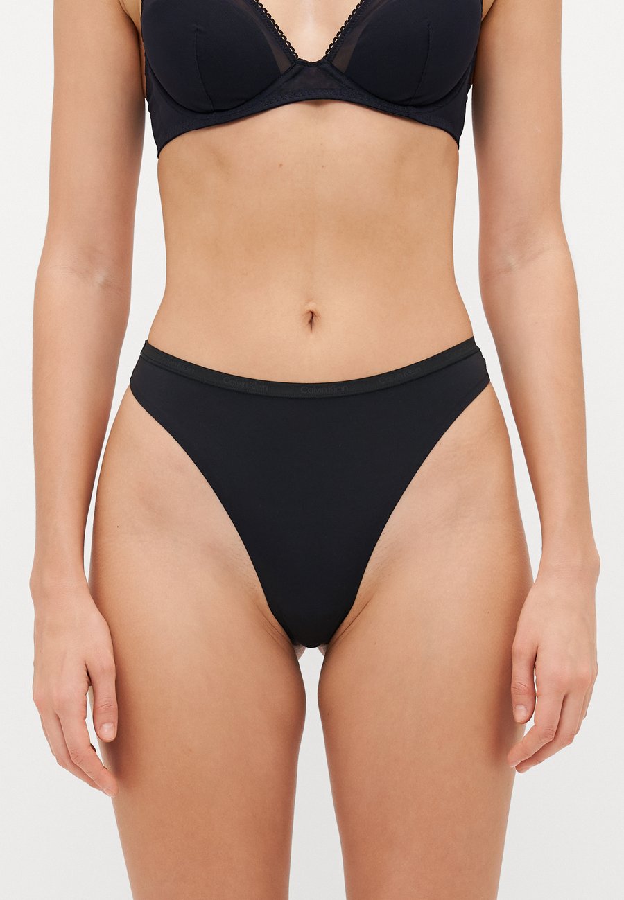 Трусы Calvin Klein Underwear THONG PERFECTLY FIT, Black
Трусы Calvin Klein Underwear THONG PERFECTLY FIT, Black
