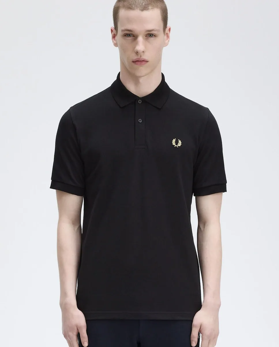 Мужская футболка поло с коротким рукавом, произведена в Англии Fred Perry, черный
Мужская футболка поло с коротким рукавом, произведена в Англии Fred Perry, черный