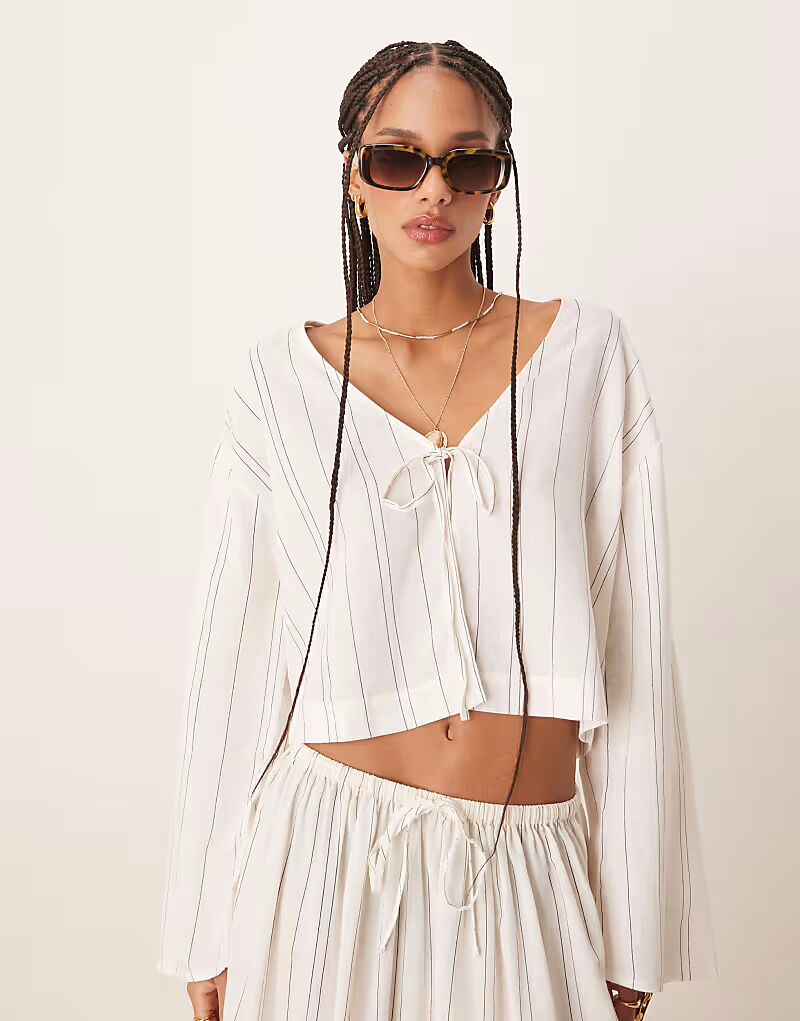 Пляжная рубашка Belle с завязкой спереди и льном в тонкую однотонную полоску Asos Design
Пляжная рубашка Belle с завязкой спереди и льном в тонкую однотонную полоску Asos Design