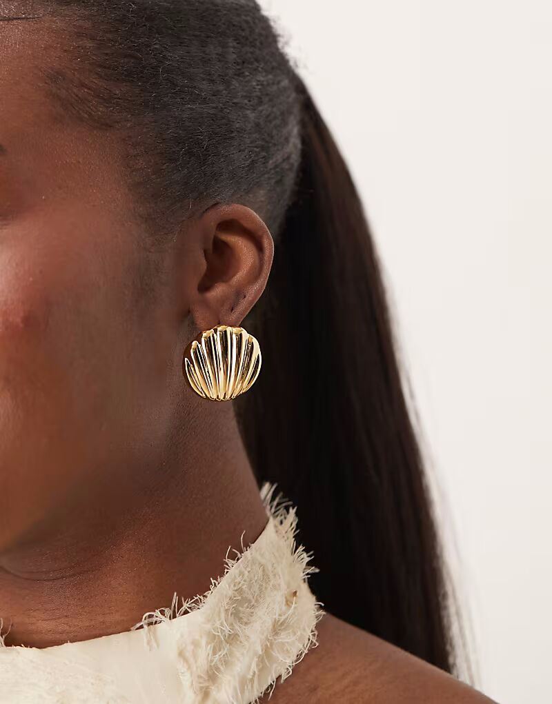 Крупные позолоченные серьги-гвоздики в форме ракушки из бледного золота Orelia
Крупные позолоченные серьги-гвоздики в форме ракушки из бледного золота Orelia